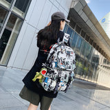 Large Capacity Schoolbag Men's Mori Personality Graffiti Printing Couple Backpack Women's Harajuku Junior High School and College Student Backpack