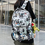 Large Capacity Schoolbag Men's Mori Personality Graffiti Printing Couple Backpack Women's Harajuku Junior High School and College Student Backpack