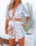 Spacious Floral Pocketed Swiss Dot Knotted Romper